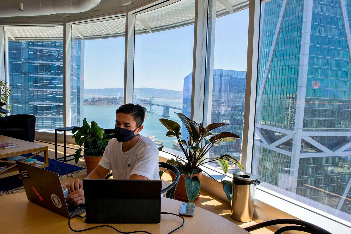 Peter Koe, a software engineer at Overflow, works in the Salesforce building in downtown San Francisco, Calif on June 15, 2021.