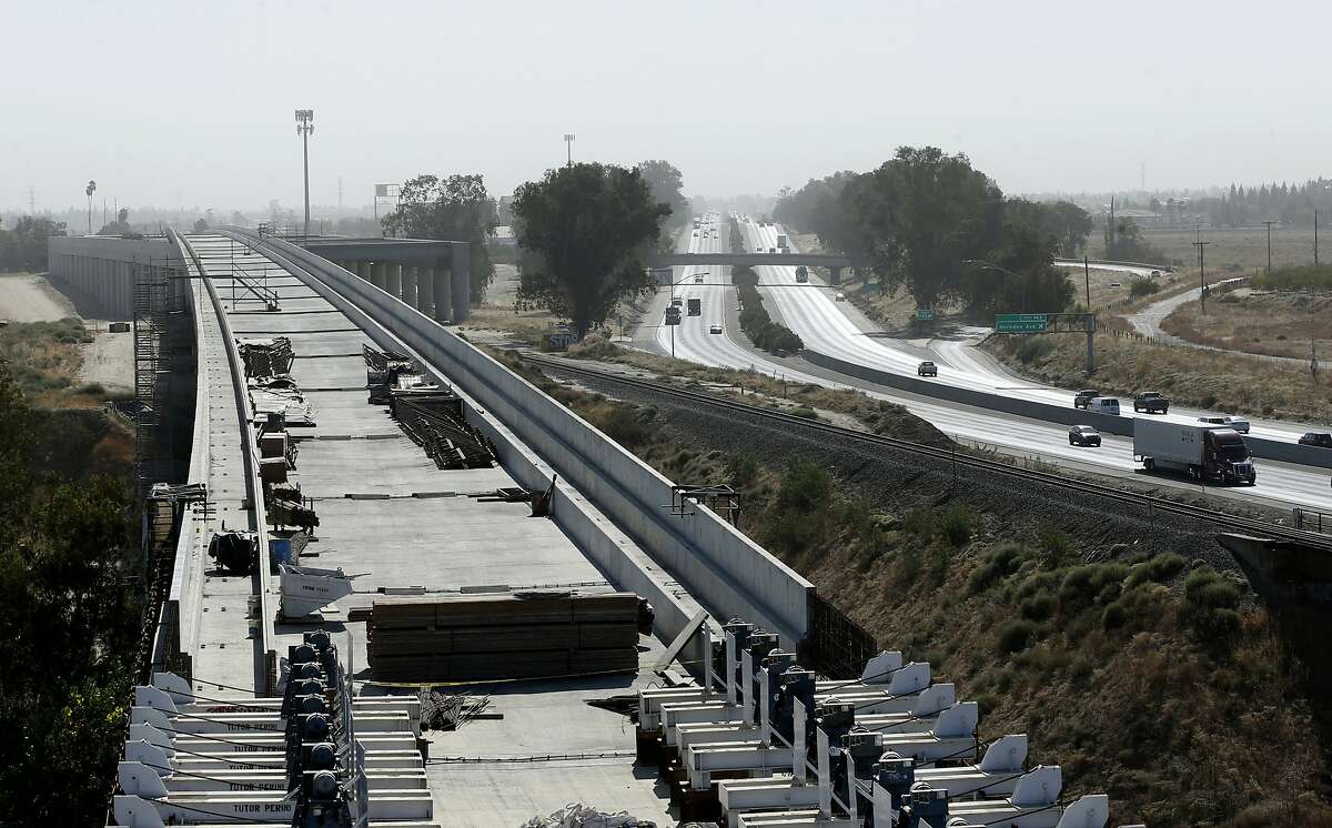 A high-speed rail viaduct is under construction for California’s troubled bullet train paralleling Highway 99 near Fresno.