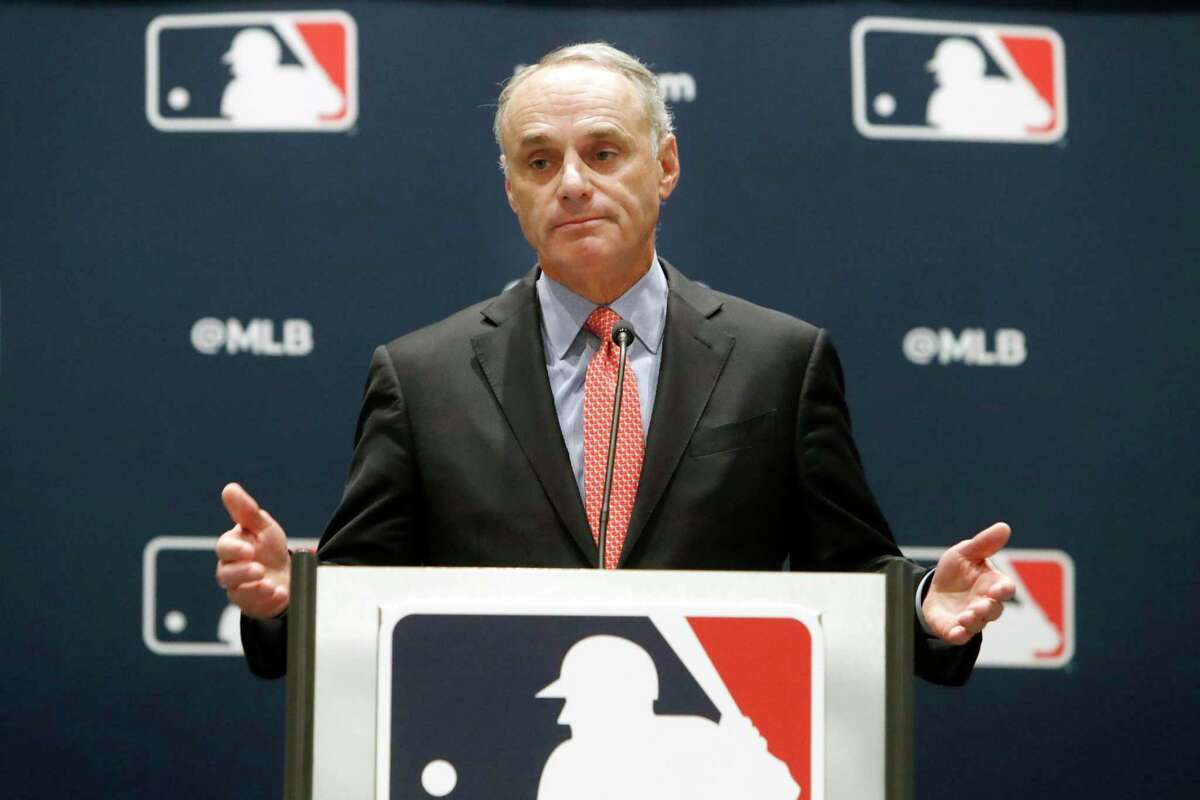 FILE - In this Nov. 21, 2019, file photo, baseball commissioner Rob Manfred speaks to the media at the owners meeting in Arlington, Texas. Pitchers will be ejected and suspended for 10 games for using illegal foreign substances to doctor baseballs in a crackdown by Major League Baseball that will start June 21. The commissioner’s office, responding to record strikeouts and a league batting average at a more than half-century low, said Tuesday, June 15, 2021, that major and minor league umpires will start regular checks of all pitchers, even if opposing managers don’t request inspections.(AP Photo/LM Otero, File)