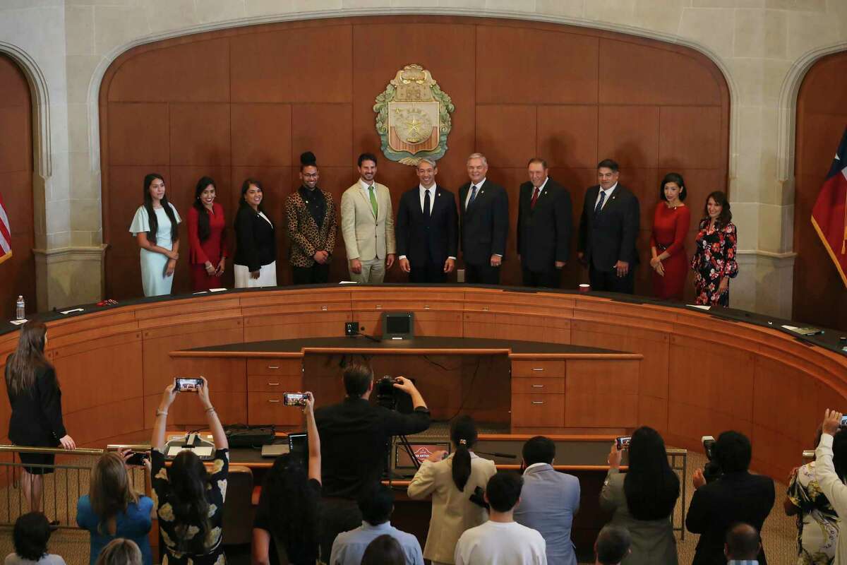 San Antonio Mayor Ron Nirenberg, center, poses with the new City Council during the formal portrait after a swearing-in ceremony, Tuesday, June 15, 2021.