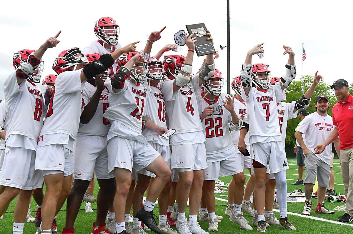 Guilderland celebrates after defeating Shaker in the Class A boys' lacrosse final on Tuesday, June 15, 2021 in Amsterdam, N.Y. (Lori Van Buren/Times Union)