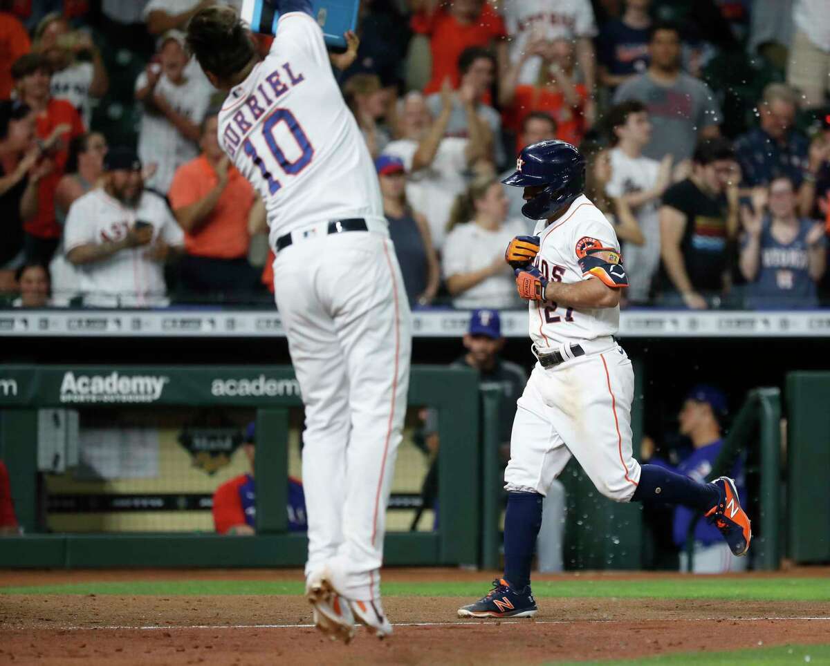 Altuve slam in 10th lifts Astros over Rangers on Baker B-day