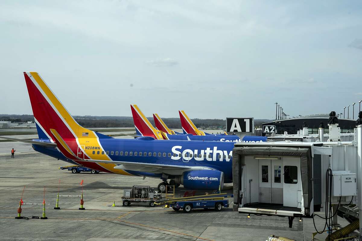 FILE -- Southwest Airlines planes are parked at gates of Baltimore/Washington International Thurgood Marshall Airport in Baltimore on March 22, 2020. Hundreds of Southwest Airlines flights were delayed or canceled again on Wednesday, June 16, 2021, as the company sought to resolve disruptions from earlier in the week. (Anna Moneymaker/The New York Times)