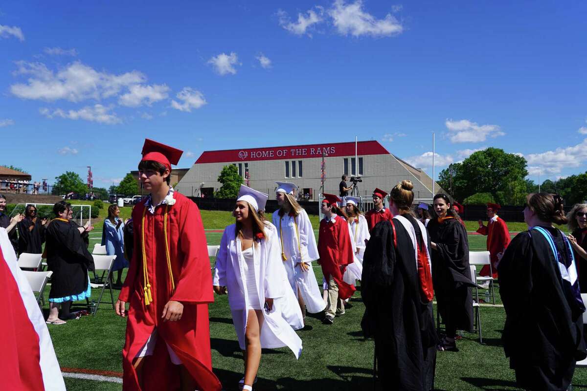 “Our New Canaan community succeeded in dealing with the historic pandemic because our residents and our students cared for each other. Our nation and our local communities need you to be kind and care for your neighbors and fellow citizens,” the first selectman told the graduates. High School Principal William Egan kept with the theme of resilience. “Tough times don’t last, but tough people do,” Egan said, complimenting the lot. He shared reasons why some “people weather a storm much better than others,” saying gratitude is a key. “We develop gratitude like a muscle,” Egan said. “Consciously, cultivating an attitude of gratitude, builds up a sort of psychological immune system that can cushion us when we fall. There is scientific evidence that grateful people are more resilient to stress.” Luizzi thanked his staff and faculty. He also talked about how Moynihan and him met every morning at 8 a.m. to coordinate town and school efforts. Graduates said the year was mixed. “It was a mix of up and down,” Michael Rivas, Class of 2021, said it was a challenge, but he worked harder than before “to keep my grades up” and was happy with the progress he made with piano, violin and school work. “It was eclectic,” graduate Hannah Moore said. ”(There have been) been a lot of ups and downs, but it came together in the end to be something special.” A “great year,” graduate Lila Brennan said. The New Canaan High School String Nonet played the Beatles song “Yesterday” at the ceremony. The Irish Blessing was sung by New Canaan High School choir members. The recession from Lambs to Rams: Tribute to Class of 2021 was composed by graduate William Haddad and mixed by fellow graduate Ian Rocha.
