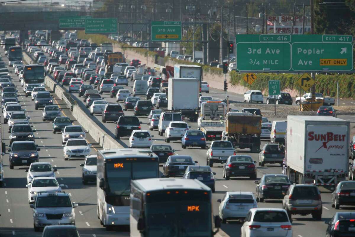 Morning commute traffic slows to a crawl in both directions of Highway 101 near the Peninsula Avenue overpass in San Mateo, Calif.