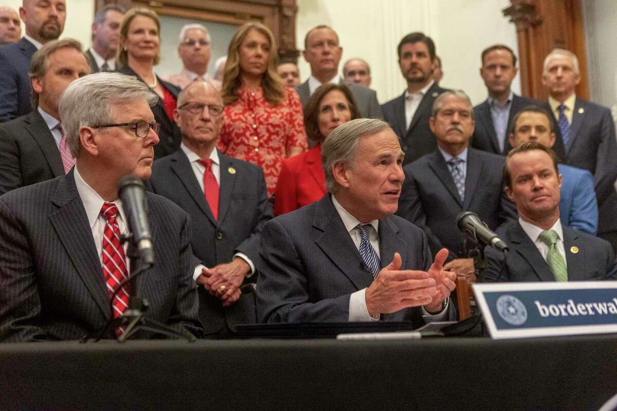Lt. Governor Dan Patrick, left, Gov. Greg Abbott and House Speaker Dade Phelan announce a plan for Texas to add new fencing along the Mexican border during a press at the Texas State Capitol, Wednesday, June 16, 2021. (Stephen Spillman / for Express-News)