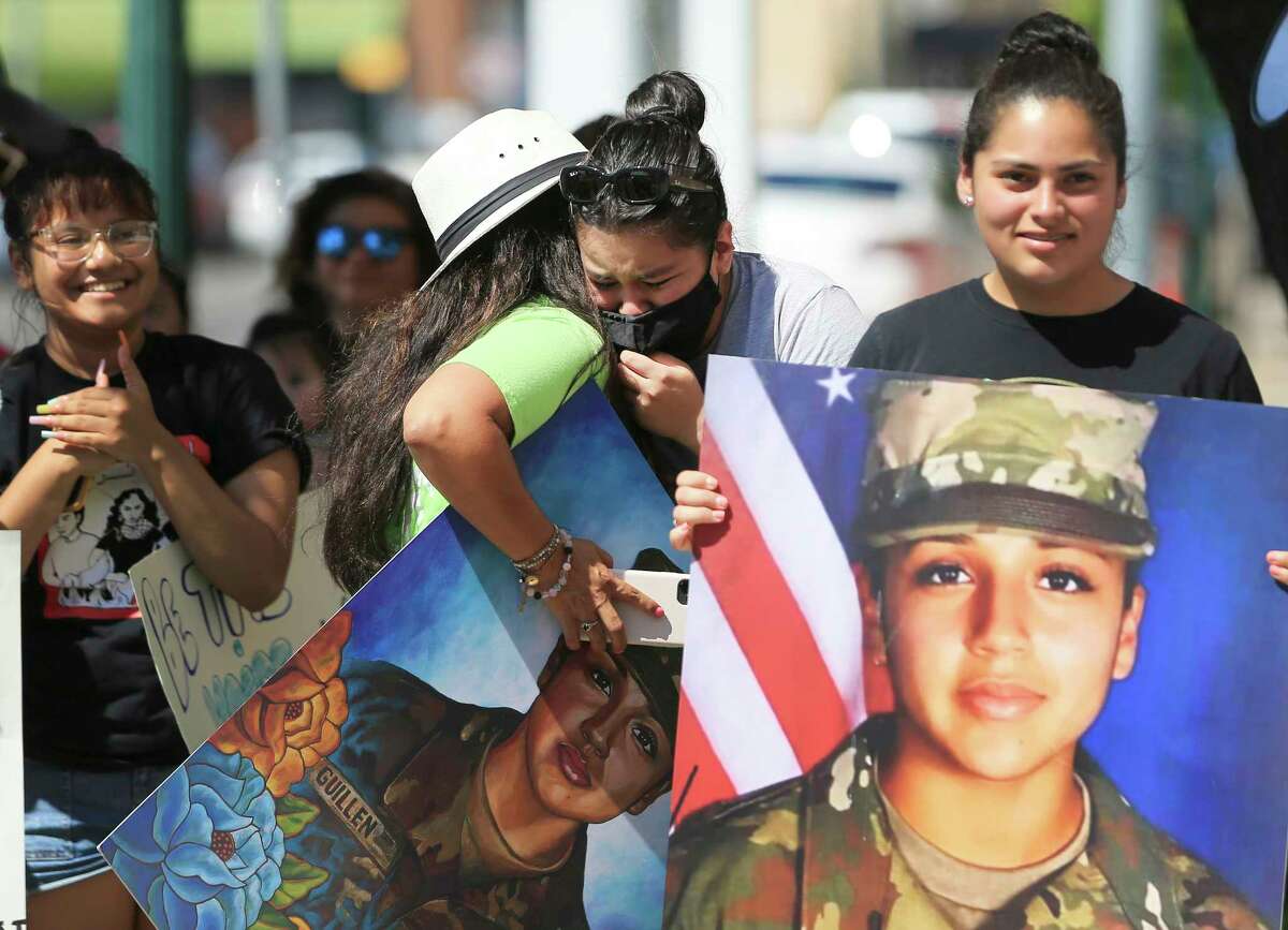 Lupe Guillén (center), whose sister was slain while on duty at Fort Hood in 2020, appears emotional as she gets a hug from supporter Larissa Martinez of San Antonio after learning outcome of a federal hearing in Waco, Texas on Wednesday, June 16, 2021 for Cecily Aguilar, the girlfriend of Guillén's suspected killer, who asked a judge to suppress her confession to police that she helped hide the late Houston soldier's body after her boyfriend bludgeoned her to death. A judge rejected her motion to suppress evidence of her police statement from a potential jury. She also has a pending motion to dismiss the entire indictment. While the hearing was underway, family members and supporters stood outside the courthouse and chanted for justice for Guillén. Aguilar's requests were denied.
