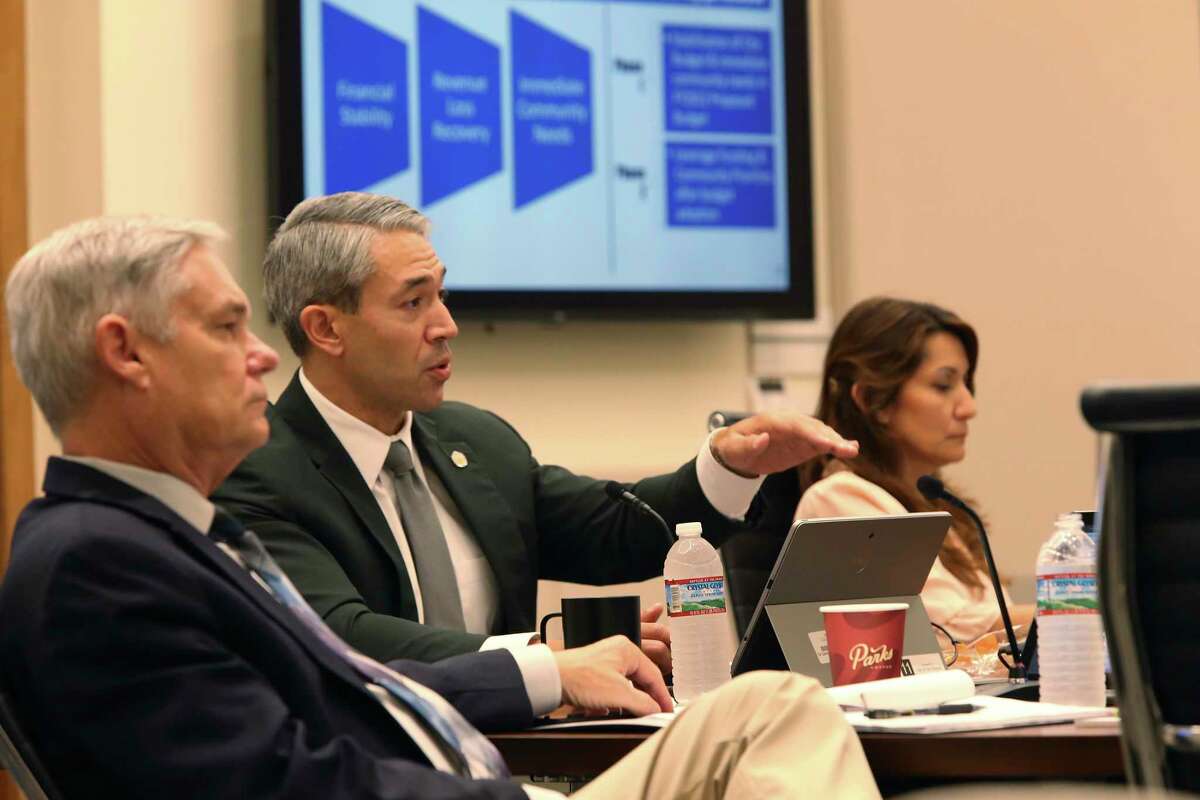 San Antonio Mayor Ron Nirenberg speaks as the city council is briefed on an early picture for next year’s budget during a meeting with City Manager Erik Walsh and city staff on June 16. On the left is City Council District 10 member Clayton Perry and on the right is District 6 member Melissa Cabello Havrda.