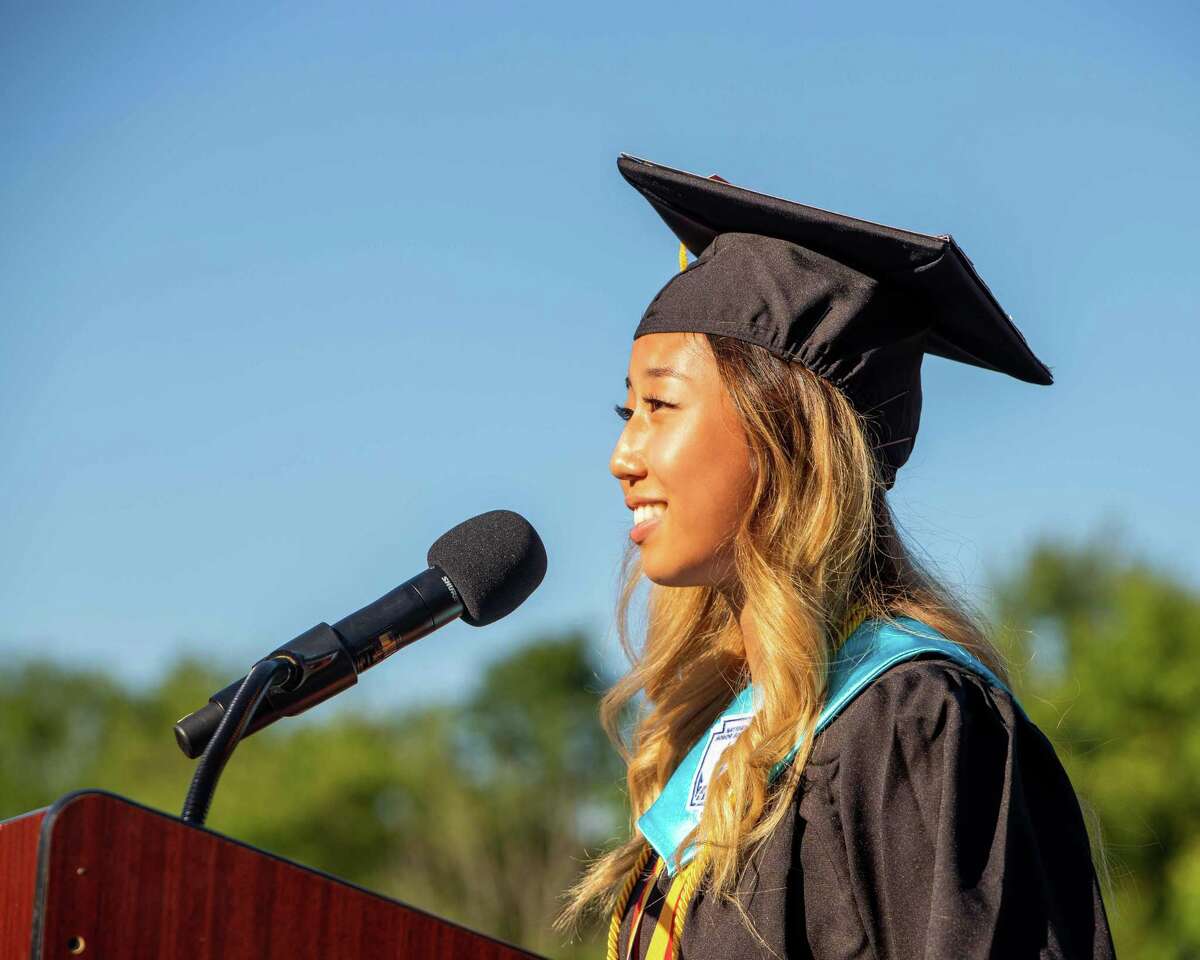 Shelton High School Salutatorian Jessica Jayaker addresses the audience at Finn Stadium during graduation for the Class of 2021 on June 16, 2021.