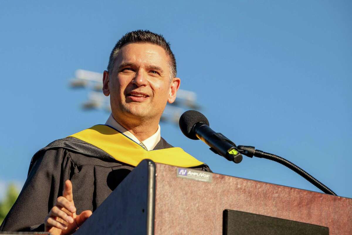 Shelton Public Schools Superintendent Kenneth Saranich addresses the audience at Finn Stadium during graduation for the Class of 2021 on June 16, 2021.