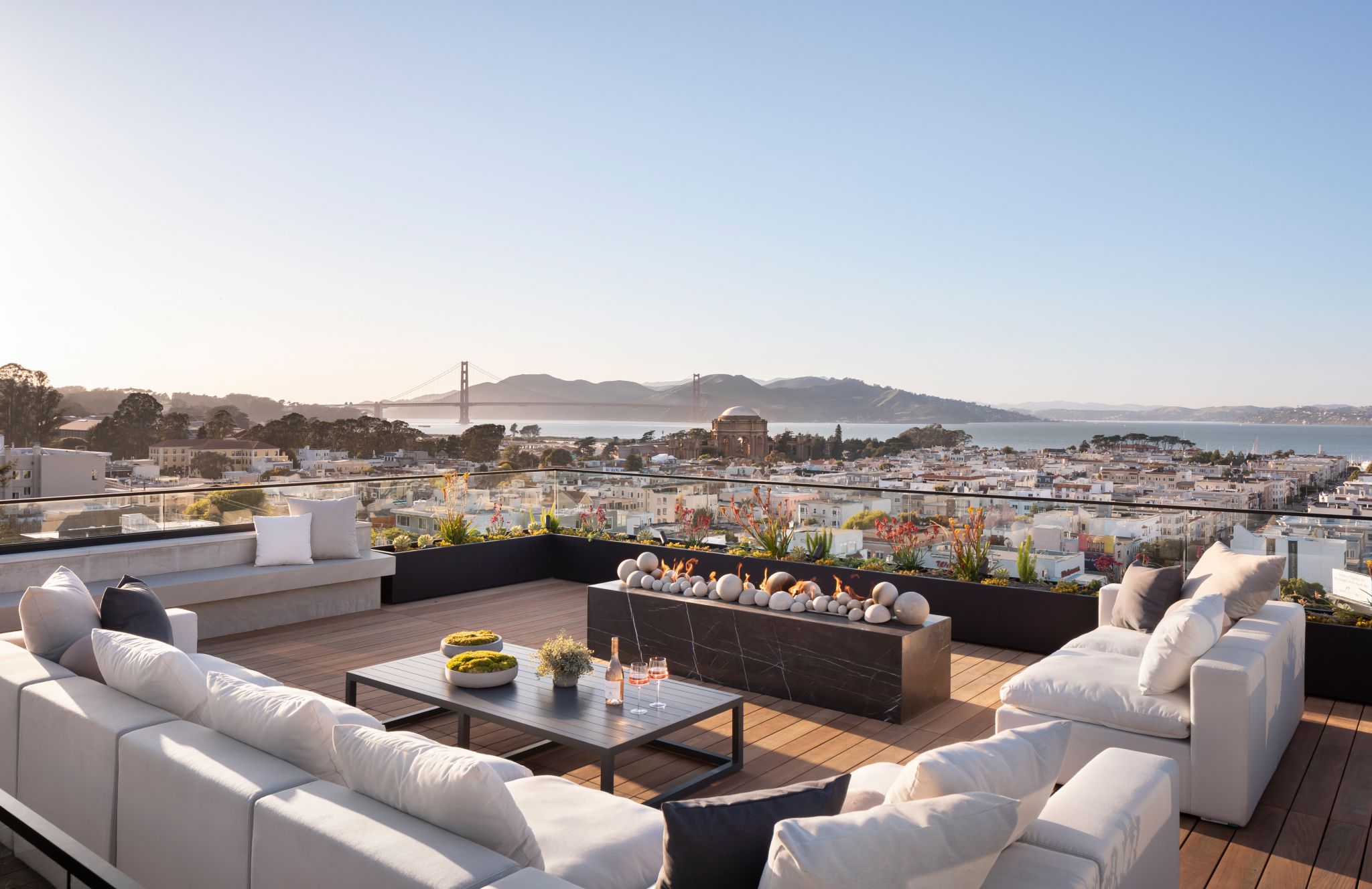 The roof deck offers a stunning view of the city and bay beyond. 