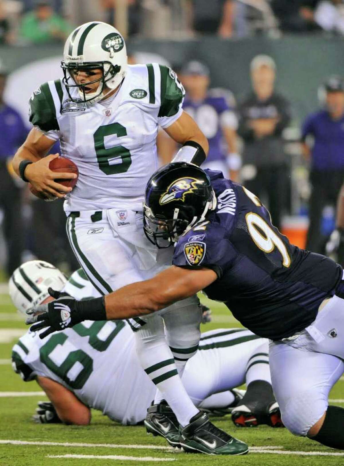 Baltimore Ravens defensive tackle Haloti Ngata (92) sacks New York Jets quarterback Mark Sanchez (6) during the fourth quarter of an NFL football game at New Meadowlands Stadium in East Rutherford, N.J., Monday, Sept. 13, 2010. The Ravens won 10-9. (AP Photo/Bill Kostroun)