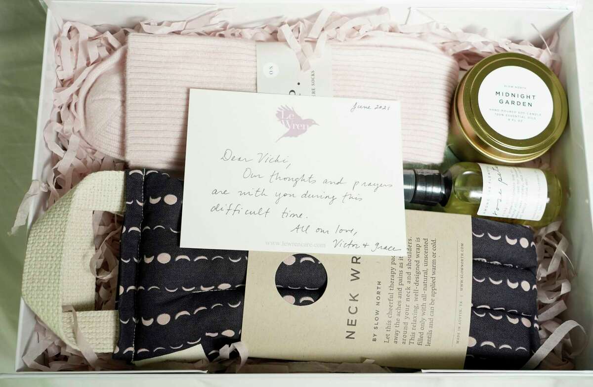 A gift box with a handwritten note is shown at the home of Serena Houlihan, co-founder of Le Wren, Wednesday, June 16, 2021 in Houston. Le Wren was created by two women, in honor of their mothers' battles with cancer. She is currently using her guest room until Le Wren moves into a larger space this summer.