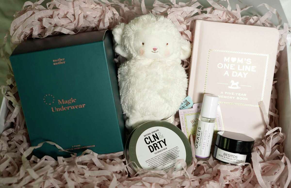 A postpartum gift box is shown at the home of Serena Houlihan, co-founder of Le Wren, Wednesday, June 16, 2021 in Houston. Le Wren was created by two women, in honor of their mothers' battles with cancer. She is currently using her guest room until Le Wren moves into a larger space this summer.
