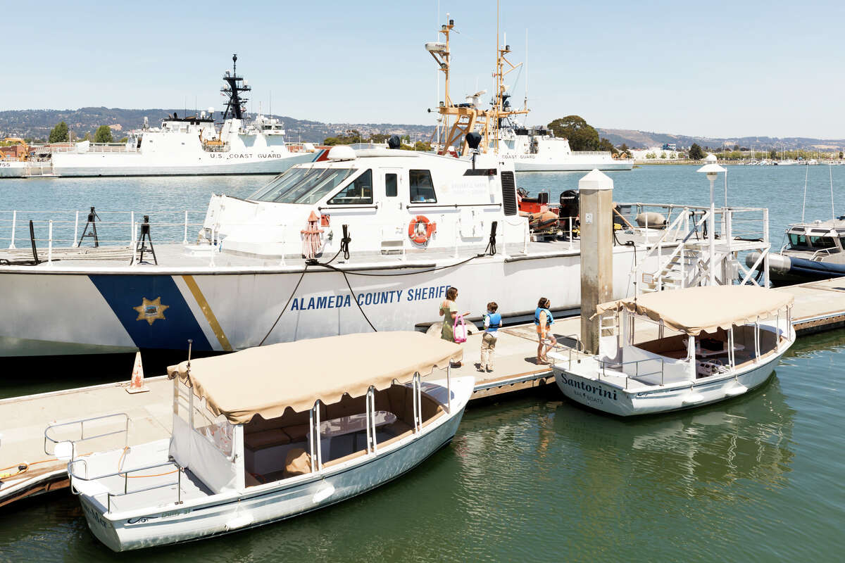 BAE boats parked alongside the Alameda County Sheriff's ships in the Oakland Estuary. 