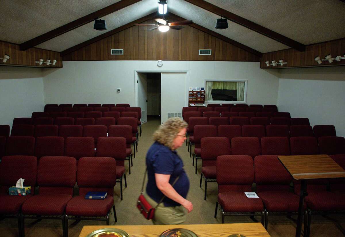 Church of Christ member Tammy Sanford walks through the sanctuary on Wednesday, June 16, 2021, in Iola. The city received money from the $1 billion in federal Hurricane Harvey money that the state of Texas distributed to local governments in May for a waste water treatment facility. Iola's worst and most recent flood happened in 2016.
