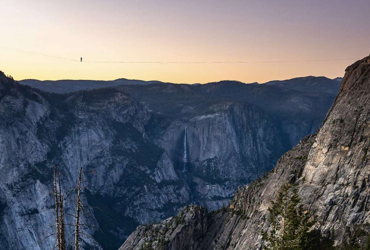 Highliner Daniel Monterrubio walks the 2,800-foot-long line off Taft Point above Yosemite Valley.