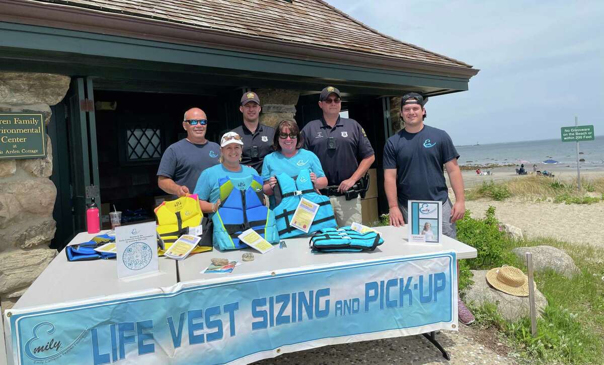 The Emily Catherine Fedorko Foundation recently held its first Swap Your Life Jackets for Emily event at the Innis Arden Cottage at Tod’s Point, kicking off National Safe Boating Week in Greenwich. From left, foundation founder Joe Fedorko, Greenwich Police Marine Division Officers Matthew Adamchak and Tom Etense, Joseph Fedorko and at front left foundation founder Pam Fedorko and board member Susan Warner. They all took part in swapping out old life vests for new ones to promote water safety.