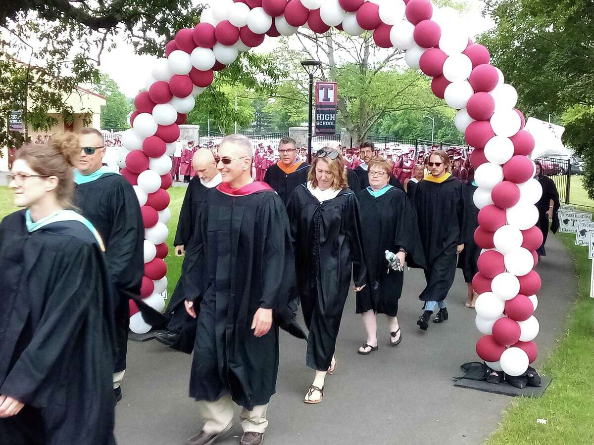 Torrington High School's class of 2021 graduated Friday night on the school campus' football field. Faculty members led the class onto the field.