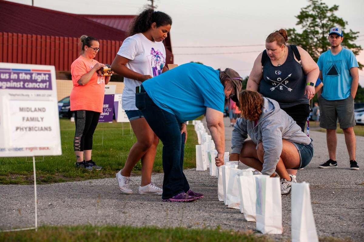 Cancer survivors, caregivers and others gather for the Luminaria display during the 2021 Midland County Relay for Life on June 19, at the Midland County Fairgrounds (Photo by Andrew Mullin/amullin@hearstnp.com).