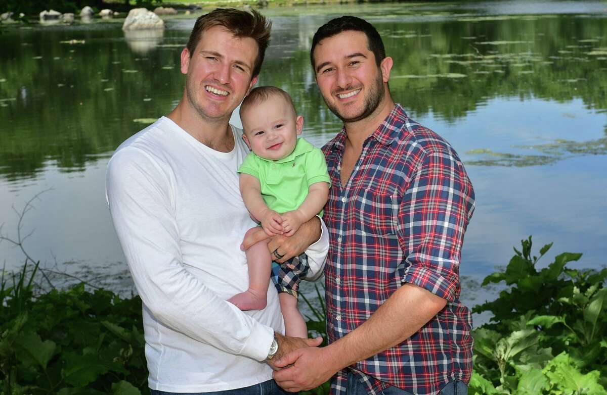 Ricky and Danny Loftus George with their son, Aspen Loftus George, 8 months, at their home in Norwalk, Conn. The Georges, are the owners of the Norwalk Conservatory of the Arts, and soon to be owners of the Conservatory College which will open in Norwalk in 2022.