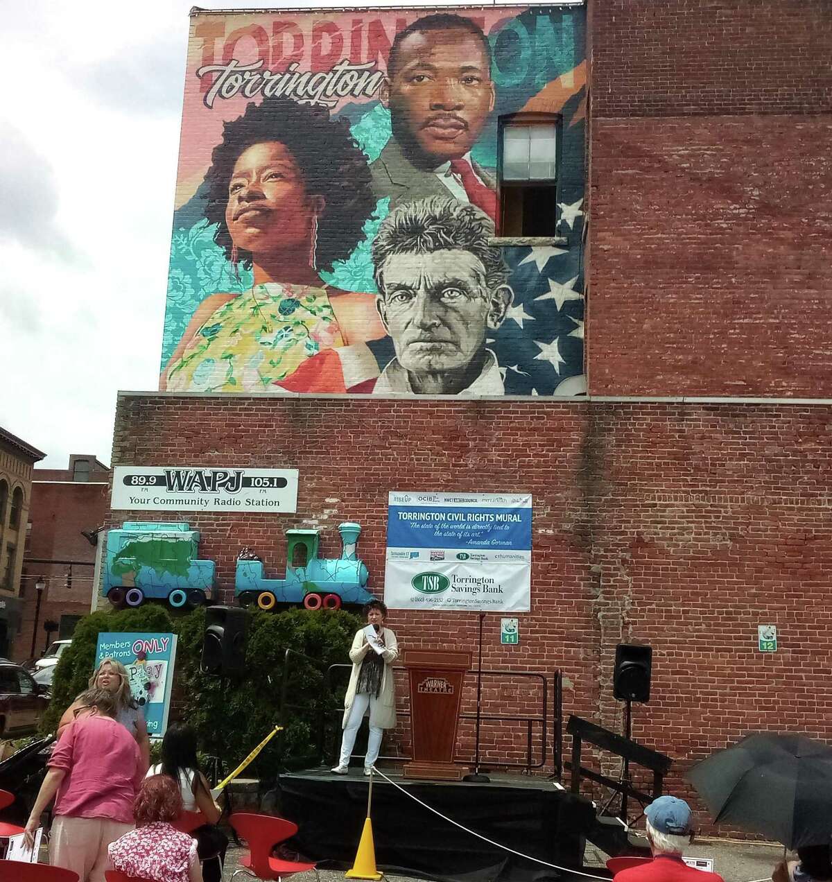 The unveiling of the MLK mural on the wall of the WAPJ building in Torrington.
