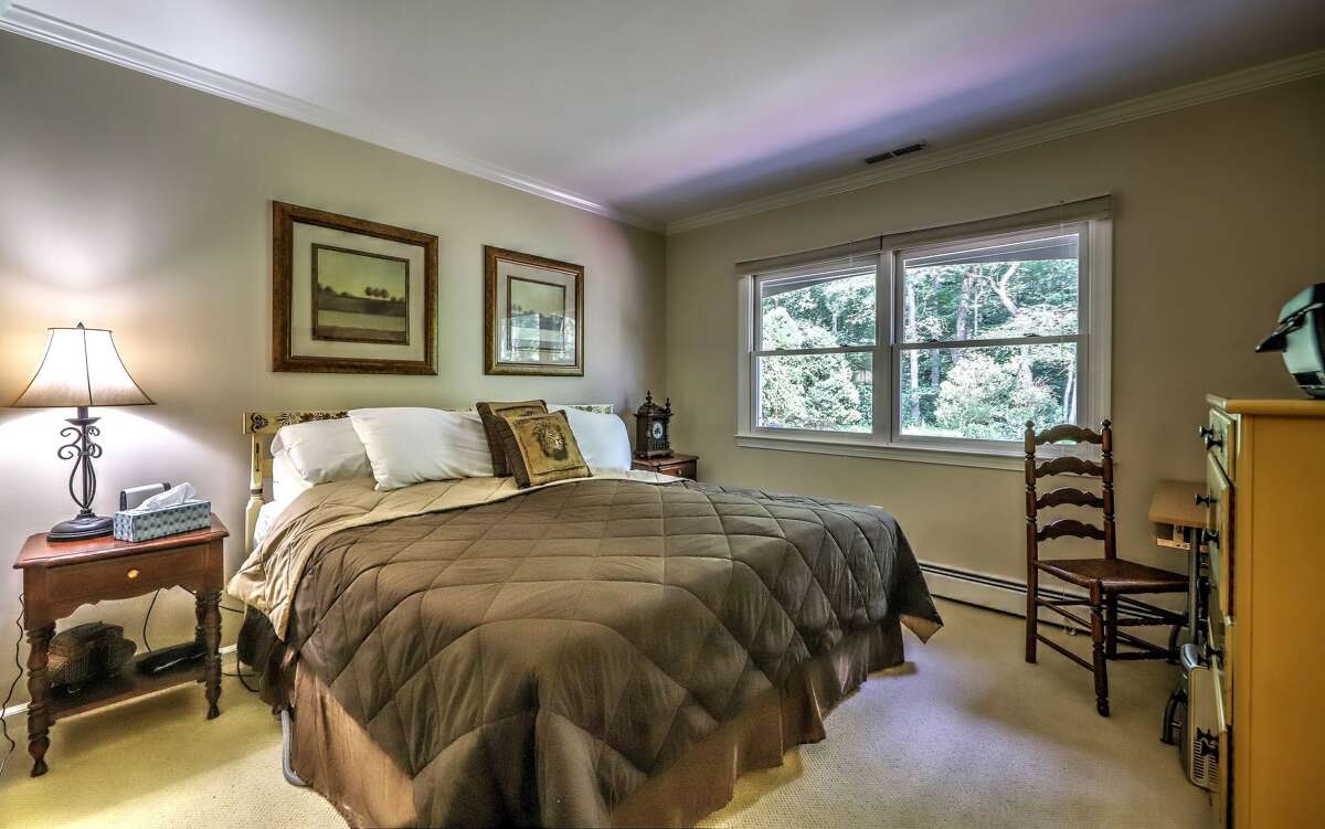 Milford ranch with glassenclosed indoor pool on the market for 595K