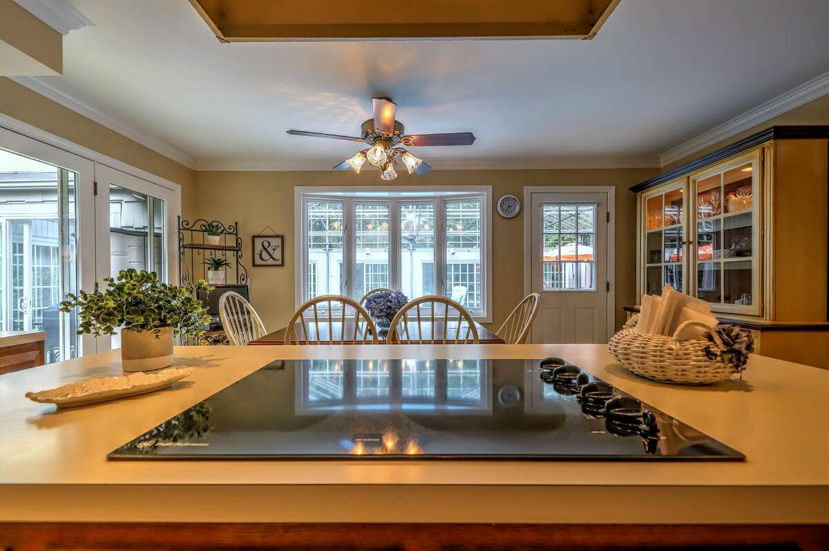 Milford ranch with glassenclosed indoor pool on the market for 595K