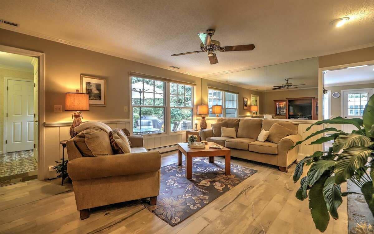 Milford ranch with glassenclosed indoor pool on the market for 595K