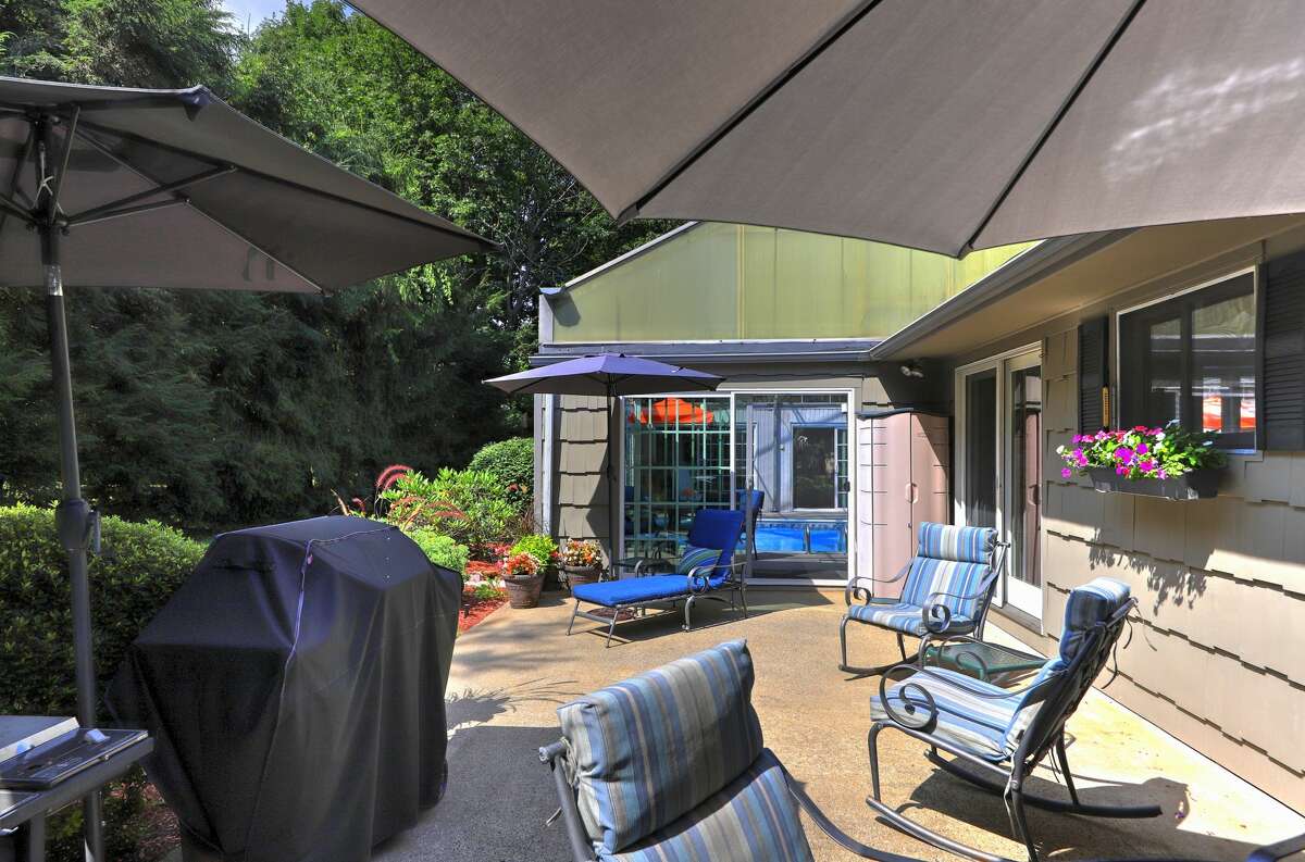 Milford ranch with glassenclosed indoor pool on the market for 595K