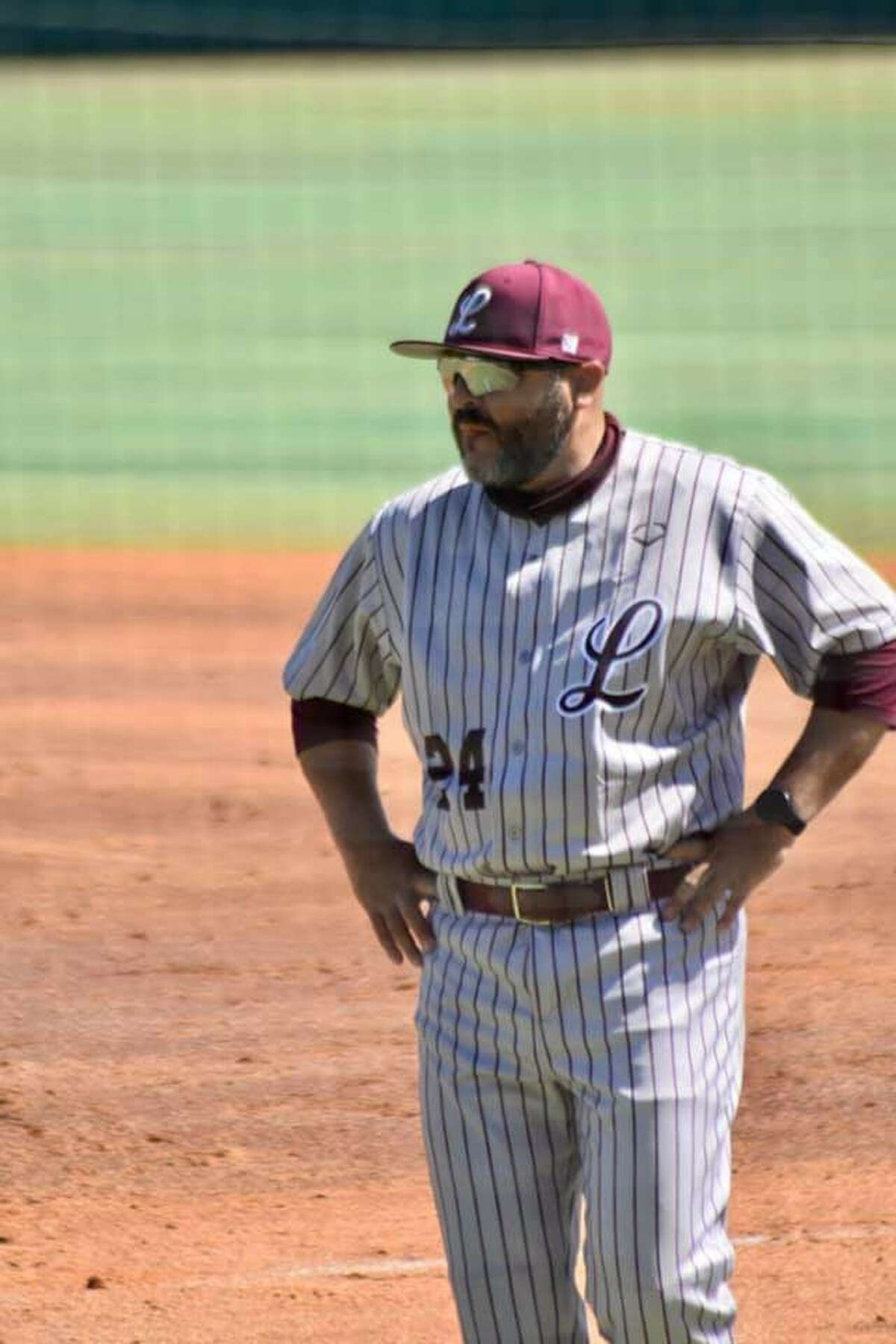 Legacy assistant Eric Garcia has been promoted to head baseball coach of the Rebels. 