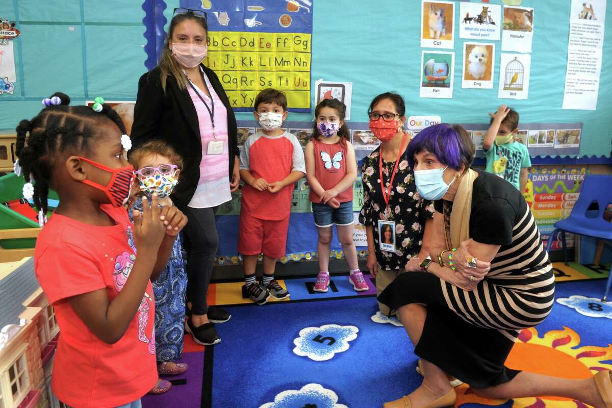 U.S. Rep. Rosa DeLauro, right, meets with students and their teachers in a classroom at TEAM’s early education program in the Margaret Egan Center, in Milford, Conn. June 21, 2021. DeLauro spoke at the center to promote child tax credit awareness.