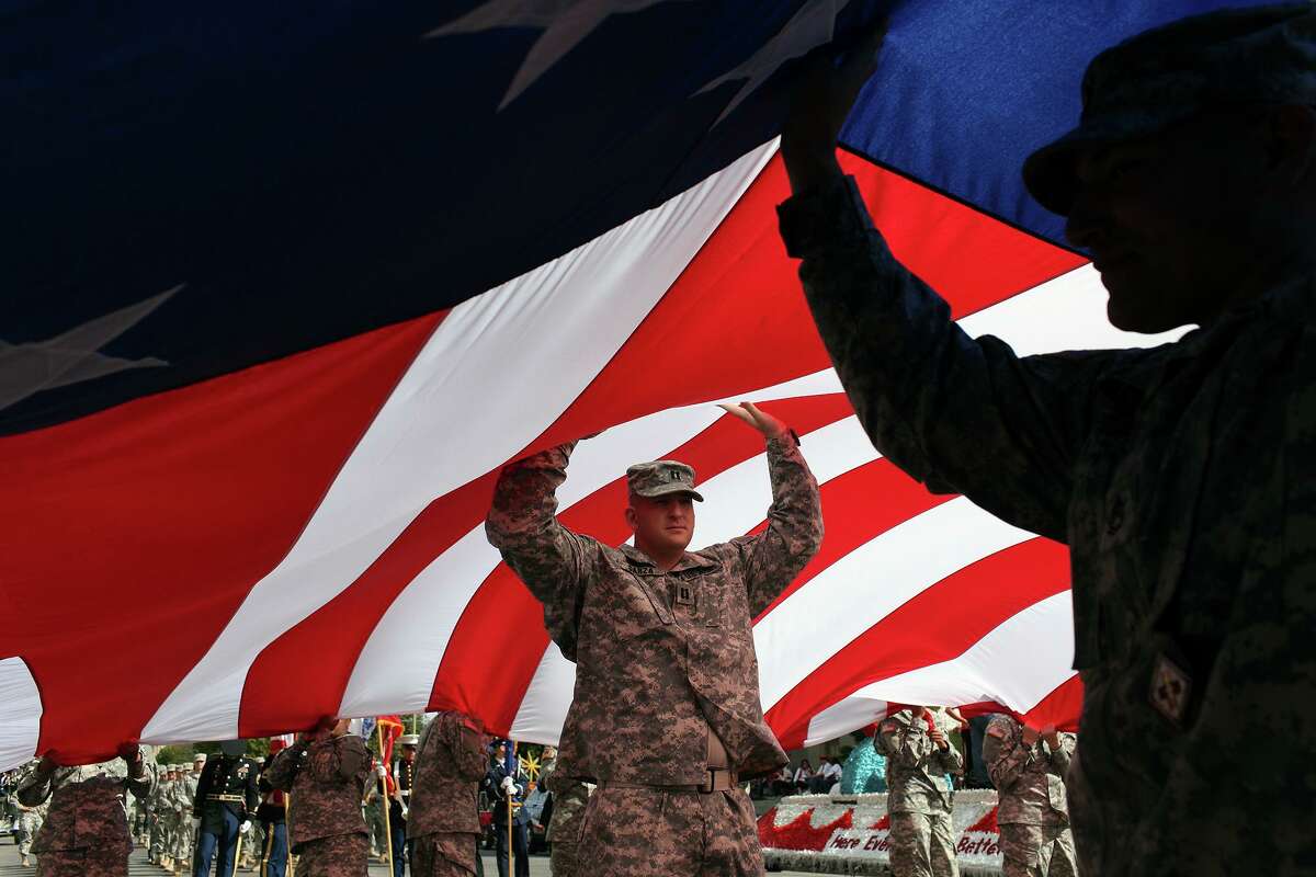Soldiers with the 32nd Medical Brigade at the Veterans Parade downtown in 2012. An Army reservist training with the brigade was found dead at Fort Sam Houston on Friday.