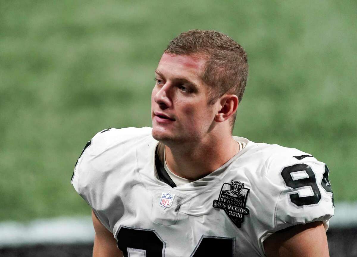 FILE - In this Nov. 29, 2020, file photo, Las Vegas Raiders defensive end Carl Nassib leaves the field after an NFL football game against the Atlanta Falcons in Atlanta. Nassib on Monday, June 21, 2021, became the first active NFL player to come out as gay. Nassib announced the news on Instagram, saying he was not doing it for the attention but because “I just think that representation and visibility are so important.” (AP Photo/John Bazemore, File)