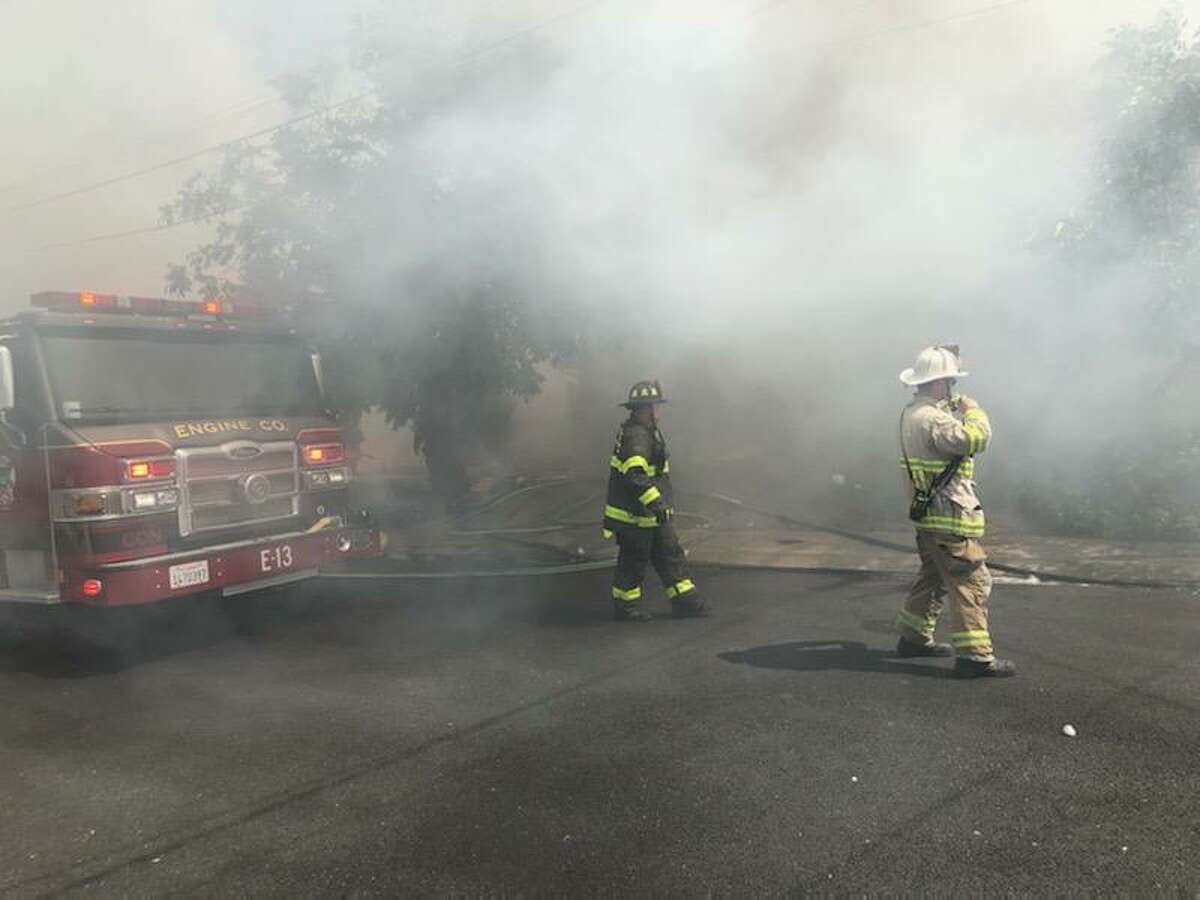 Firefighters from the Contra Costa County Fire Protection District battled a fire that burned two homes in Pleasant Hill on Monday, June 21, 2021.