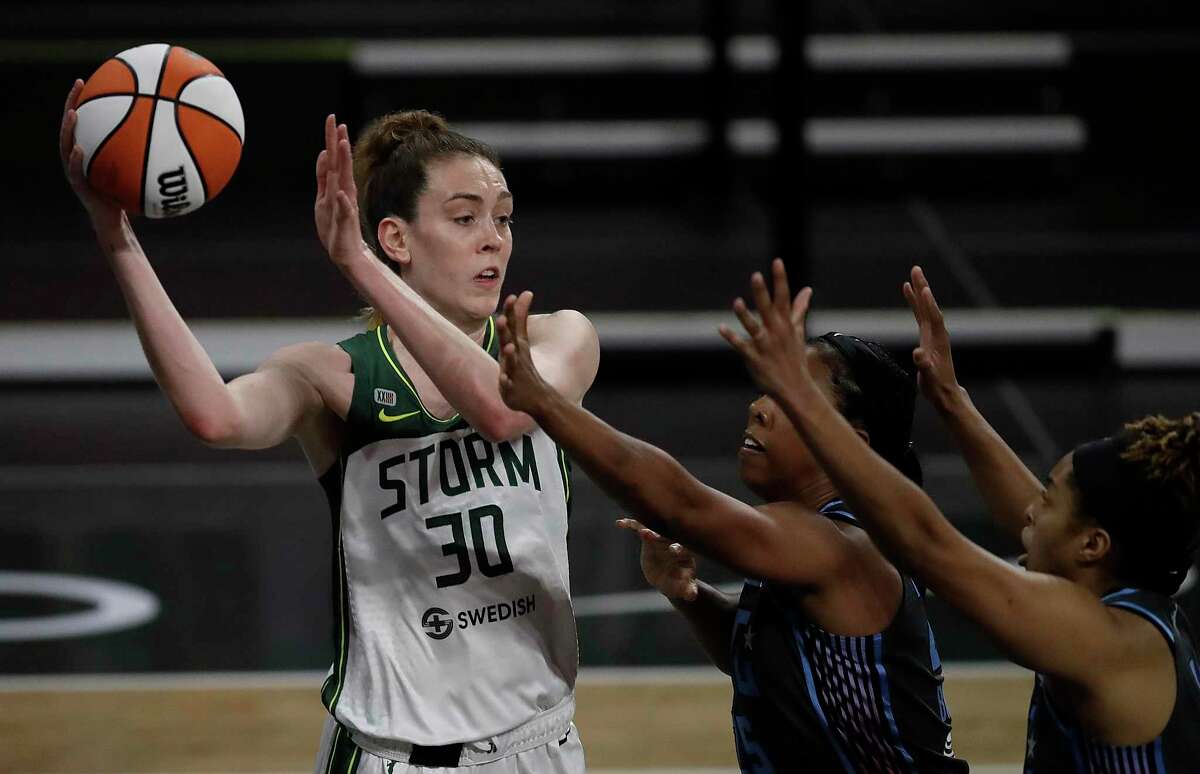 Seattle Storm forward Breanna Stewart looks to pass away from the Atlanta Dream during the first half of an WNBA basketball game Friday, June 11, 2021, in College Park, Ga. (AP Photo/Ben Margot)