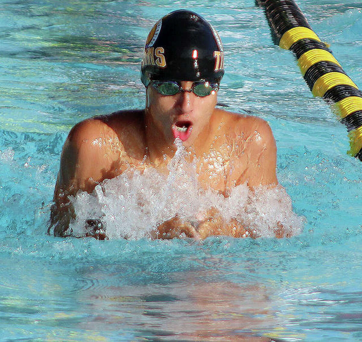 Daniel Sanchez of the Montclaire Marlins does the breaststroke portion of the 15-18 boys medley relay Monday at the SWISA Relays meet at Sunset Hills Country Club in Edwardsville.