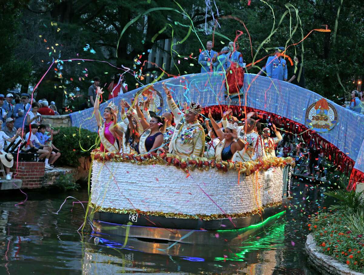 Rey Feo Scholarship program float is greeted with a barrage of confetti and streamers at the Texas Cavaliers River Parade on Monday, June 21, 2021.