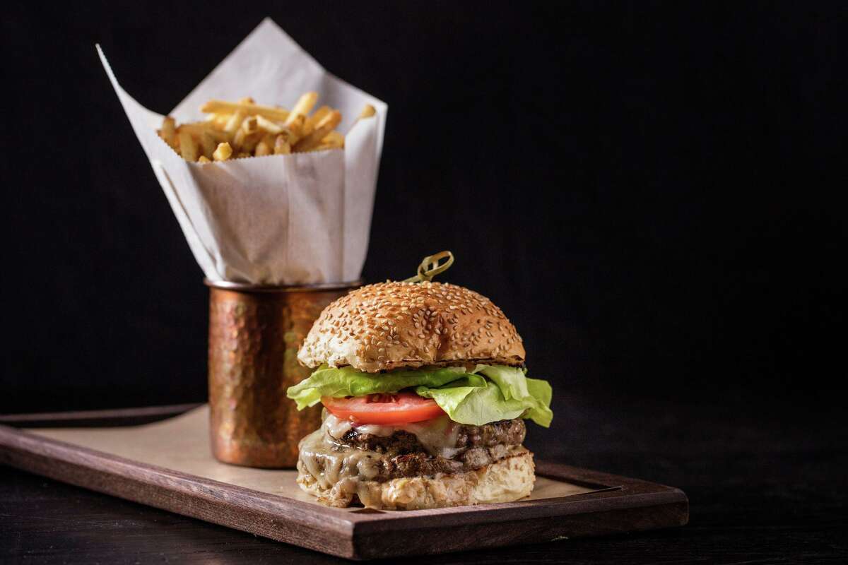A Wheelhouse burger ($18) on seeded brioche features D’Artagnan grass-fed beef.