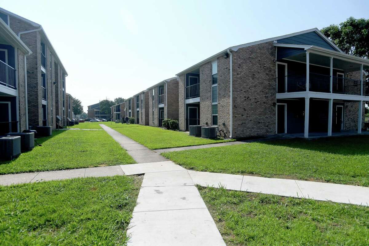 Members of the GLO, ITEX - the property management company for Pebble Creek Apartments in Port Arthur - and Mayor Thurman Bartie gathered at the complex for a ribbon cutting and celebration of the final repairs that were made after Harvey using money from the GLO's disaster recovery assistance program. $16 million in grants were made available for multi-family dwelling repairs or new construction. Thirteen such units in Jefferson County - at least 5 of which were located in Port Arthur - benefitted from the program. Photo made Wednesday, June 16, 2021 Kim Brent/The Enterprise