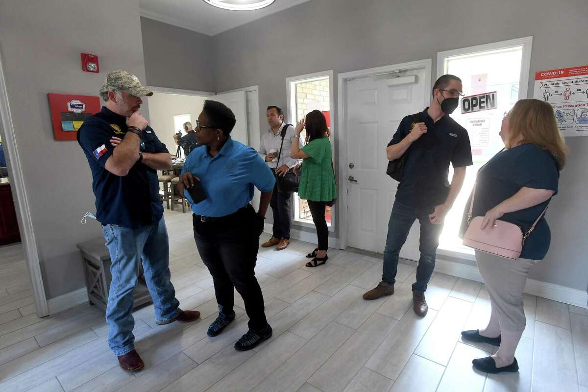 Members of the GLO, ITEX - the property management company for Pebble Creek Apartments in Port Arthur - and Mayor Thurman Bartie gathered at the complex for a ribbon cutting and celebration of the final repairs that were made after Harvey using money from the GLO's disaster recovery assistance program. $16 million in grants were made available for multi-family dwelling repairs or new construction. Thirteen such units in Jefferson County - at least 5 of which were located in Port Arthur - benefitted from the program. Photo made Wednesday, June 16, 2021 Kim Brent/The Enterprise