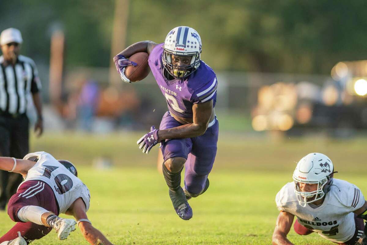 Eagles DeAnthony Gatson (9) leaves defenders in the dust as he runs for a touchdown in the first half. The Newton Eagles hosted the New Waverly Bulldogs for a rare Monday Night Football game. Photo made on October 12, 2020. Fran Ruchalski/The Enterprise