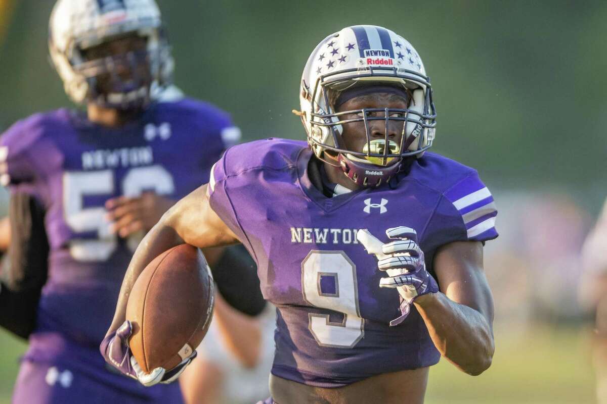 Eagles DeAnthony Gatson (9) runs for another touchdown in the first half. The Newton Eagles hosted the New Waverly Bulldogs for a rare Monday Night Football game. Photo made on October 12, 2020. Fran Ruchalski/The Enterprise