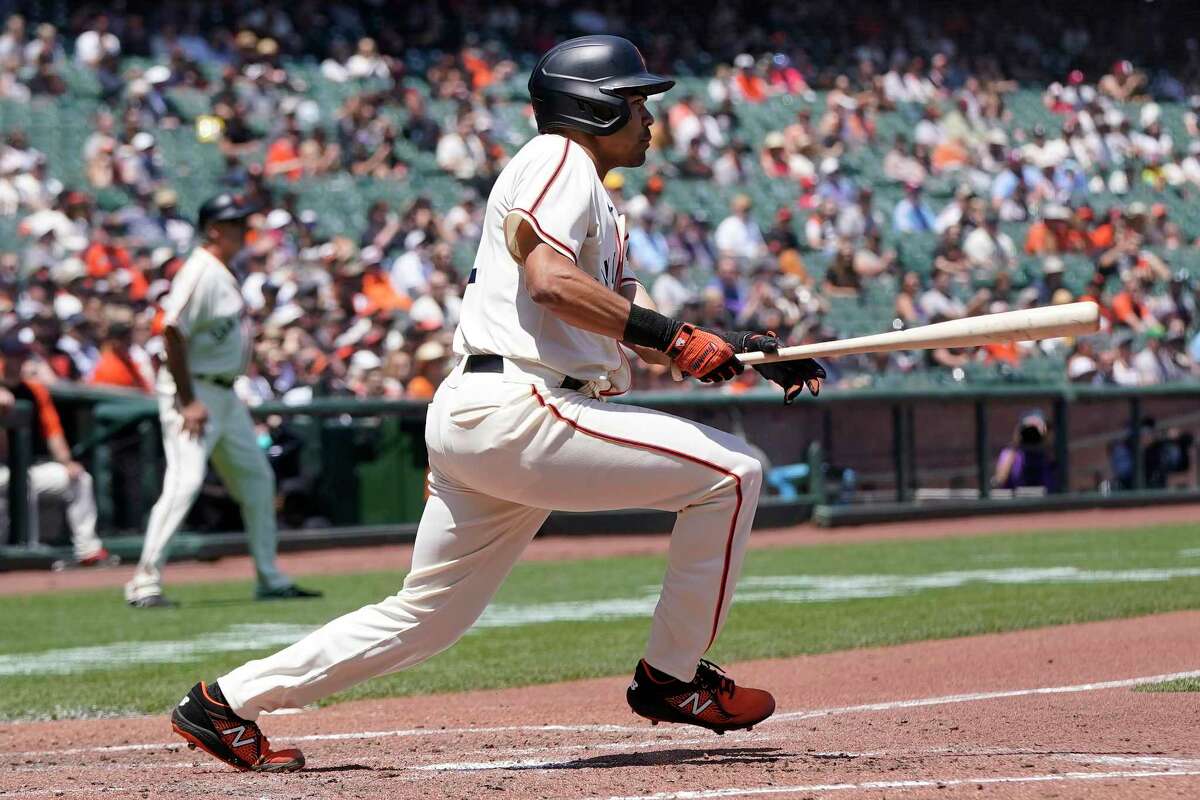 San Francisco Giants' LaMonte Wade Jr. hits a two-run double against the Philadelphia Phillies during the second inning of a baseball game in San Francisco, Saturday, June 19, 2021. (AP Photo/Jeff Chiu)