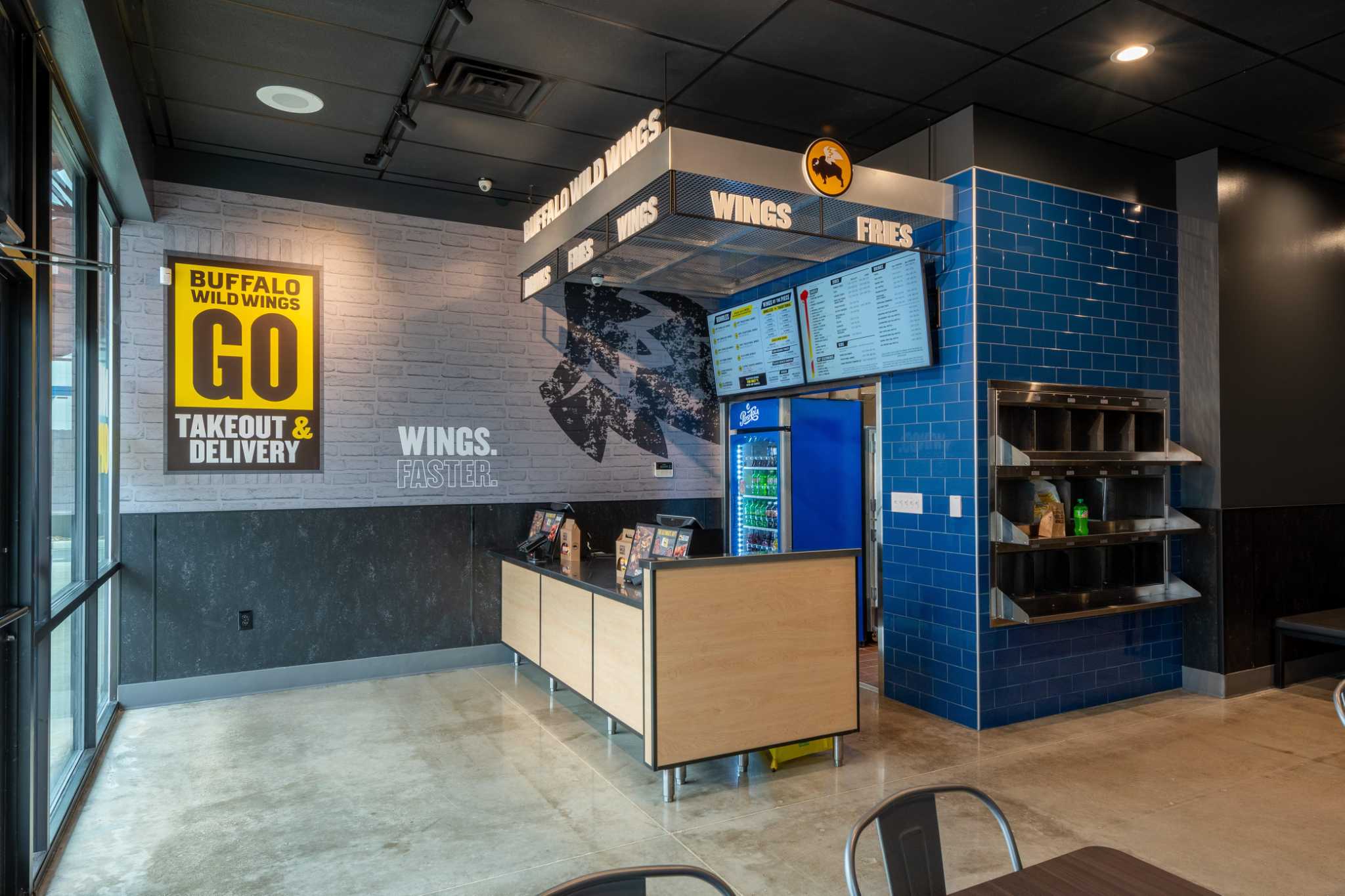 Wings brings takeout and concept to new Spring location