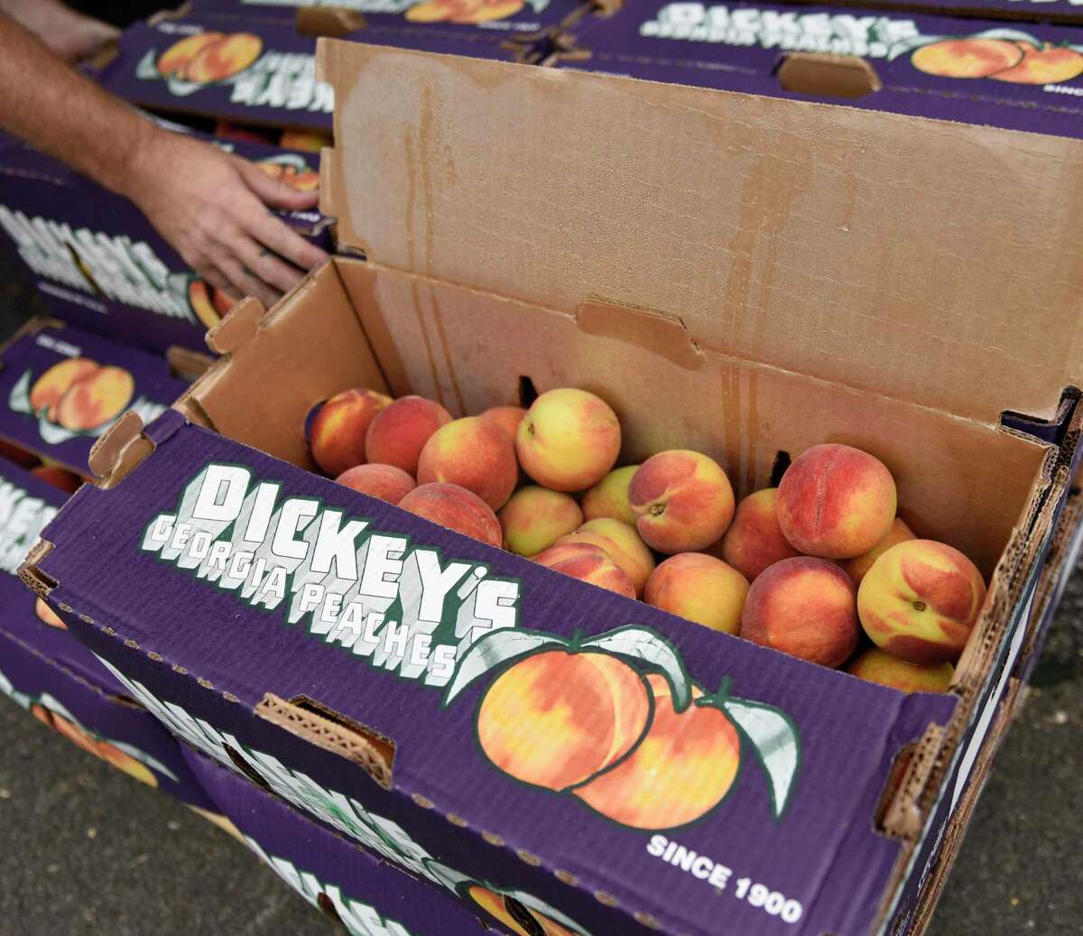 In photos The Peach Truck brings a shipment of fresh fruit direct to