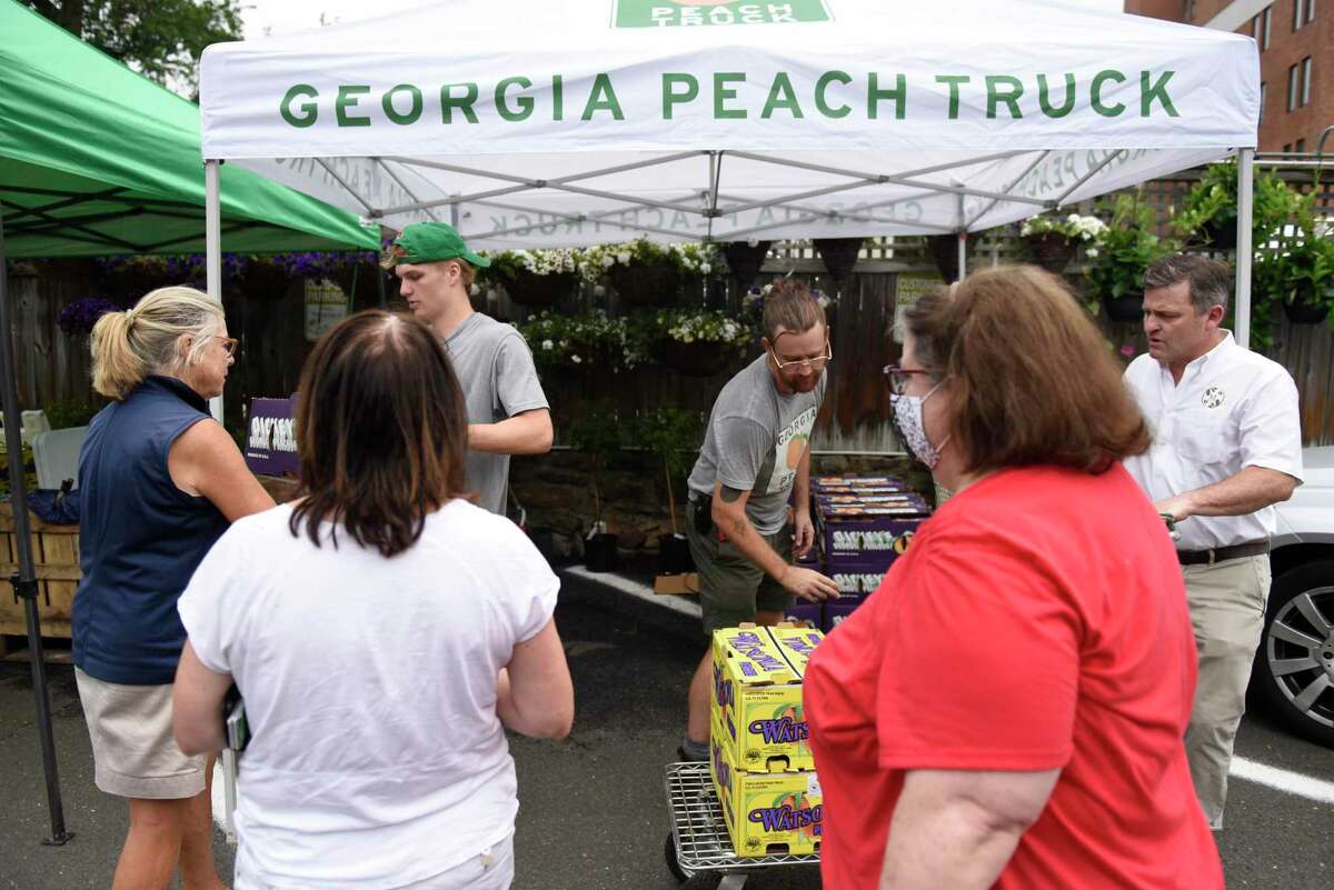 In photos The Peach Truck brings a shipment of fresh fruit direct to