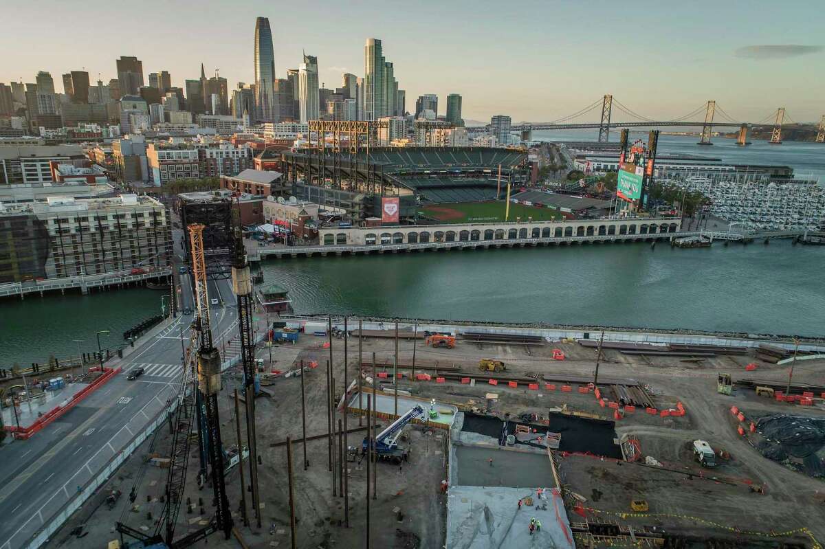 Construction crews pour concrete in a section of the new Mission Rock development near Oracle Park. The development, a collaboration between the San Francisco Giants, Tishman Speyer and the Port of San Francisco is building with the impending sea level rise in mind and elevating the ground level.