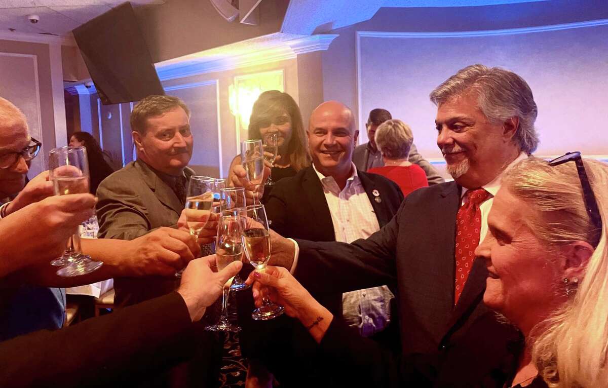 Longtime GOP operative Ben Proto, a lawyer from Stratford, second from right, was elected chairman of the state Republican party Tuesday night.