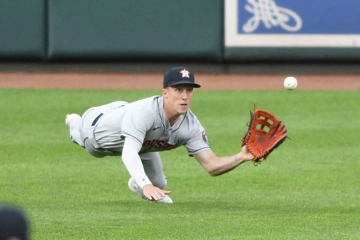 Springe'r's inside-the-park homer, diving catch and throw lead